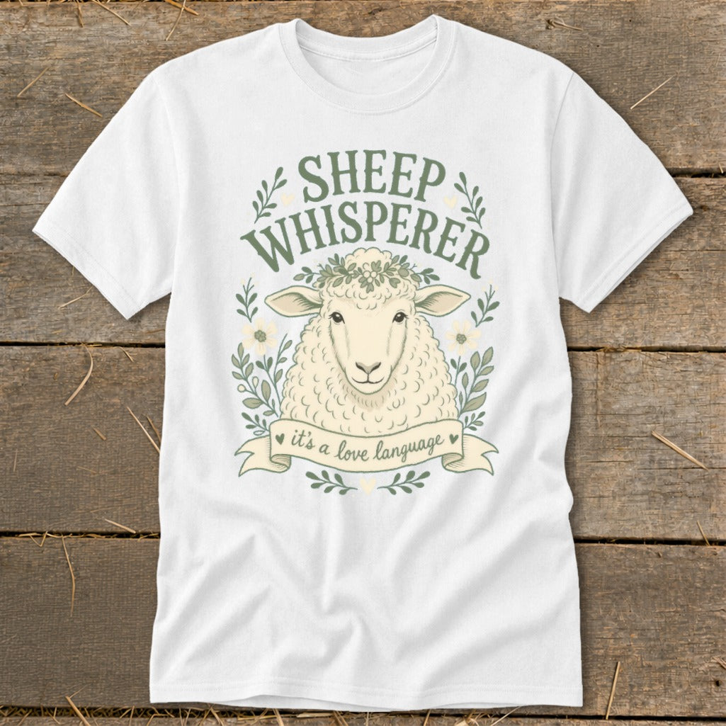 White t-shirt with a sheep illustration and text "SHEEP WHISPERER it's a love language".