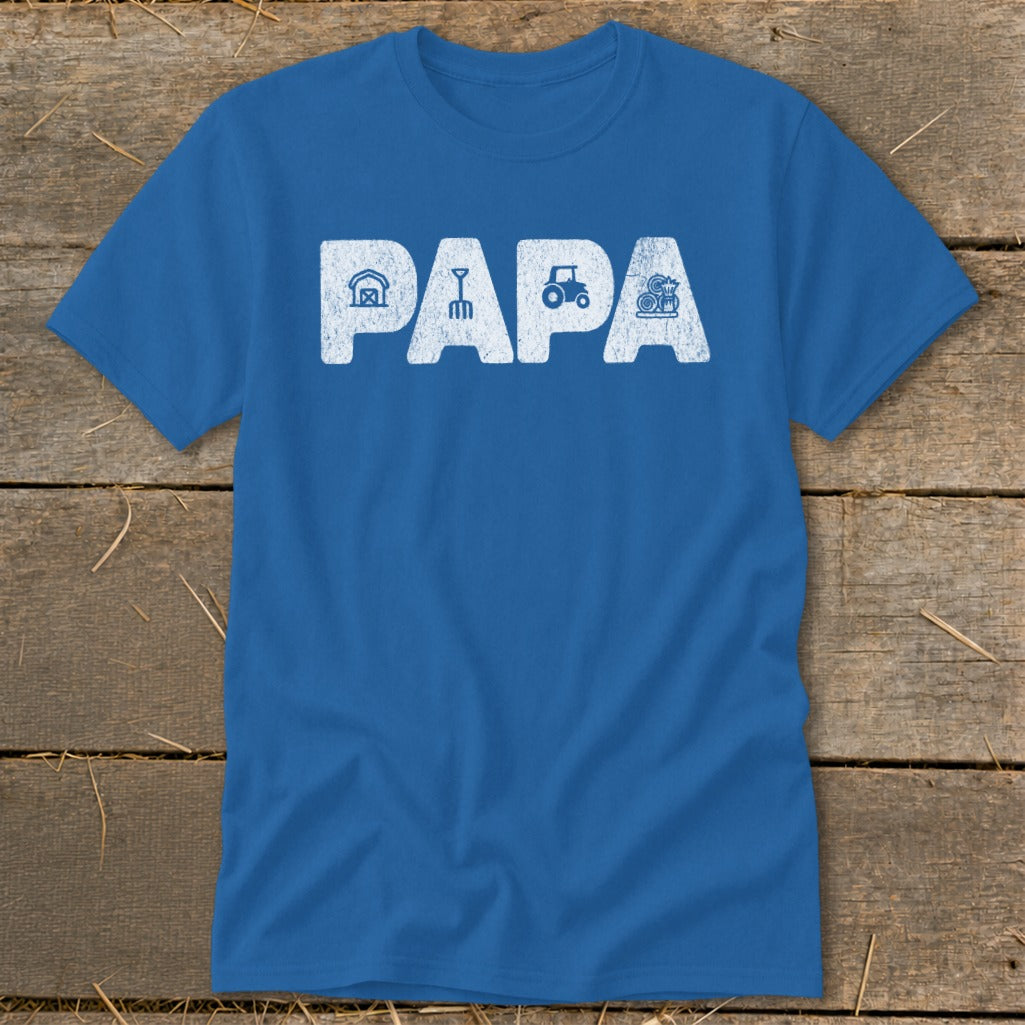 Blue t-shirt with white distressed text "PAPA" and farm-themed icons.