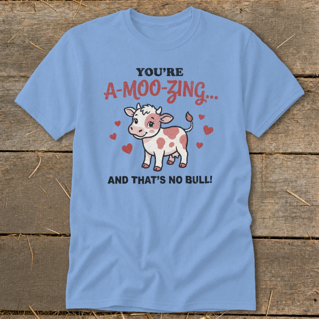 Light blue t-shirt with "You're A-Moo-zing... And That's No Bull!" and a cartoon cow.