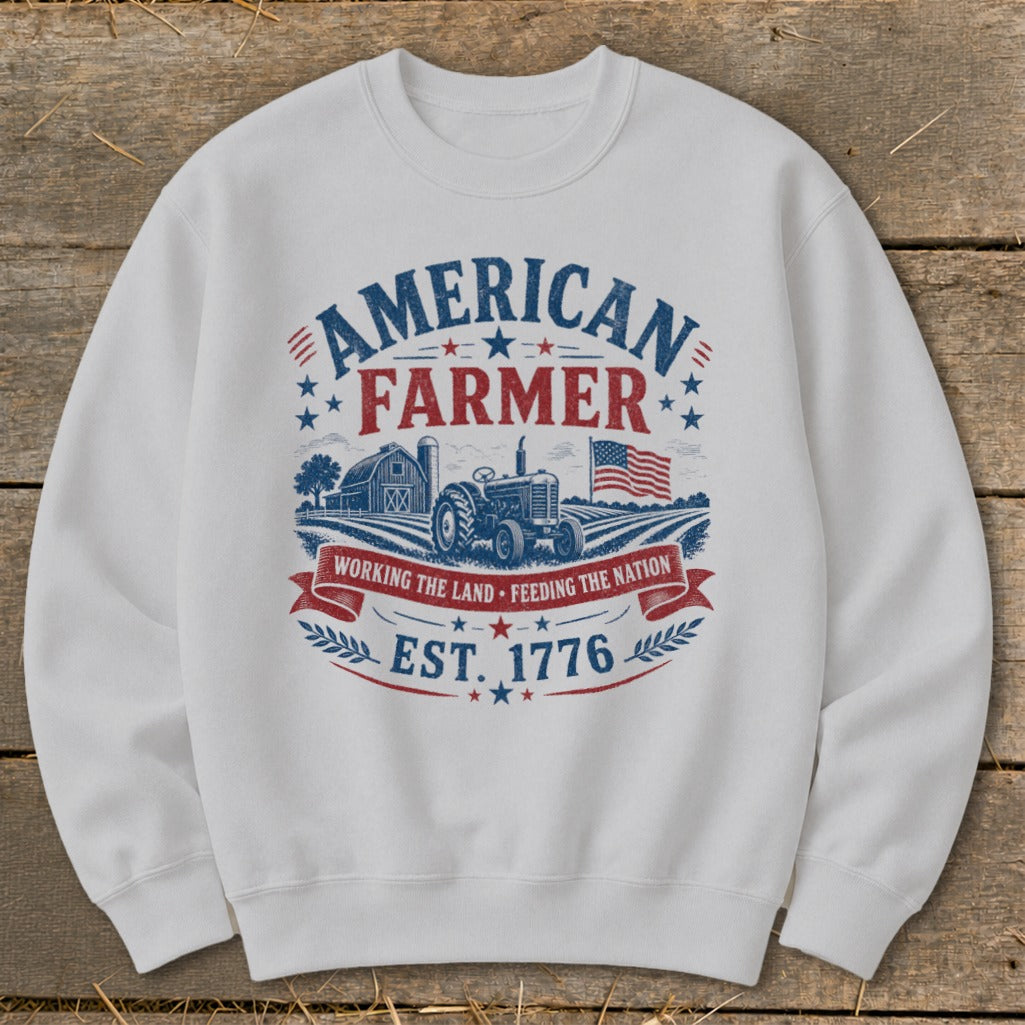 American Farmer sweatshirt with tractor, barn, and American flag graphic.