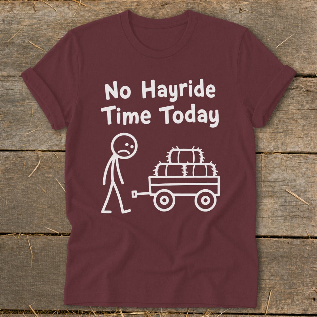 Maroon t-shirt with white text "No Hayride Time Today" and stick figure with wagon of hay.