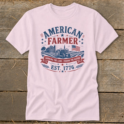 T-shirt with American Farmer graphic featuring tractor, barn, flag, and "EST. 1776".