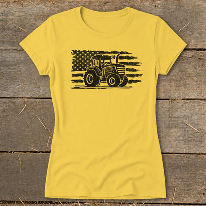 Yellow t-shirt with black distressed tractor and American flag graphic.