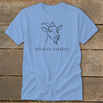 Light blue t-shirt with a minimalist goat line drawing and text "TOTALLY GOATED".