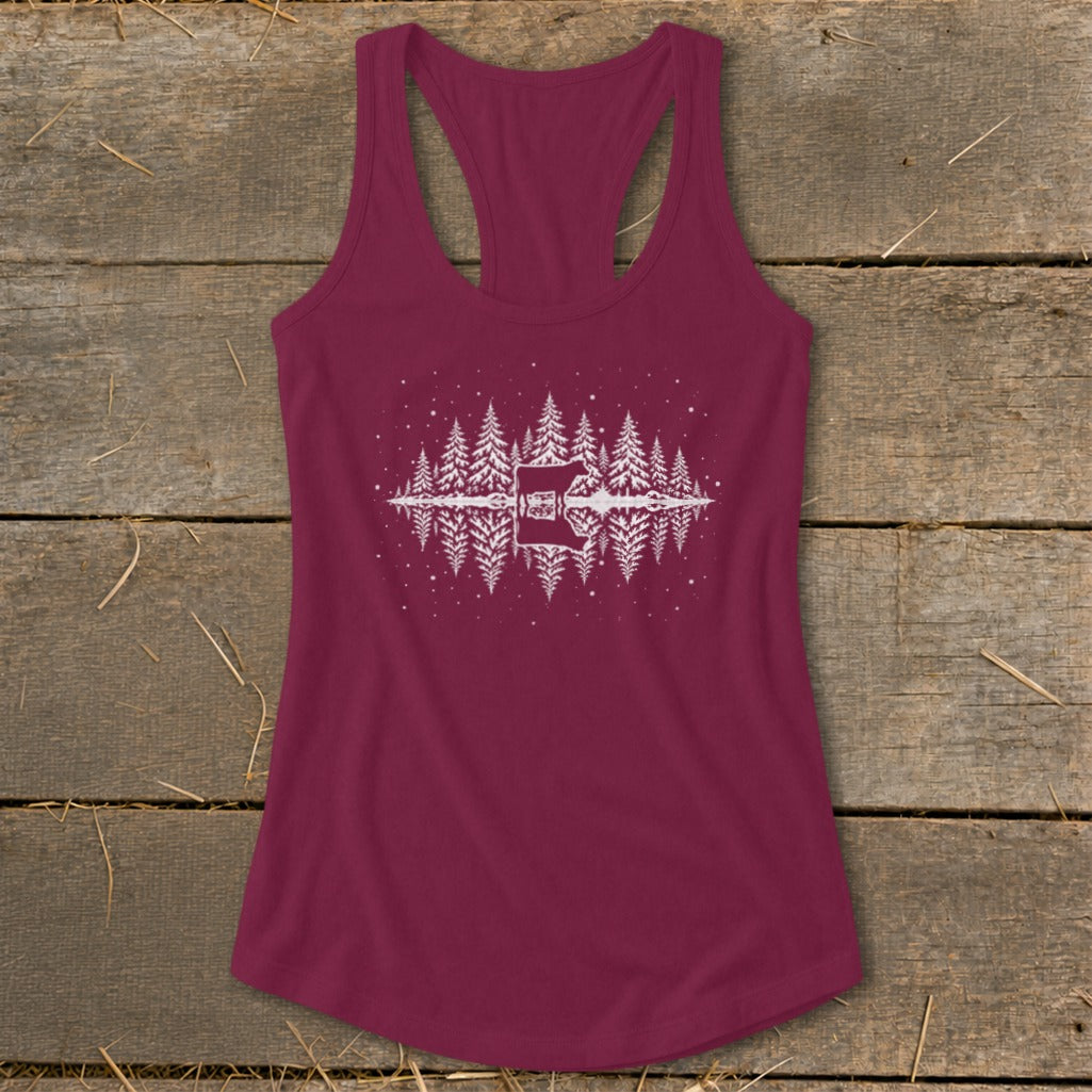Maroon tank top with white reflection print of pine trees and a cabin.