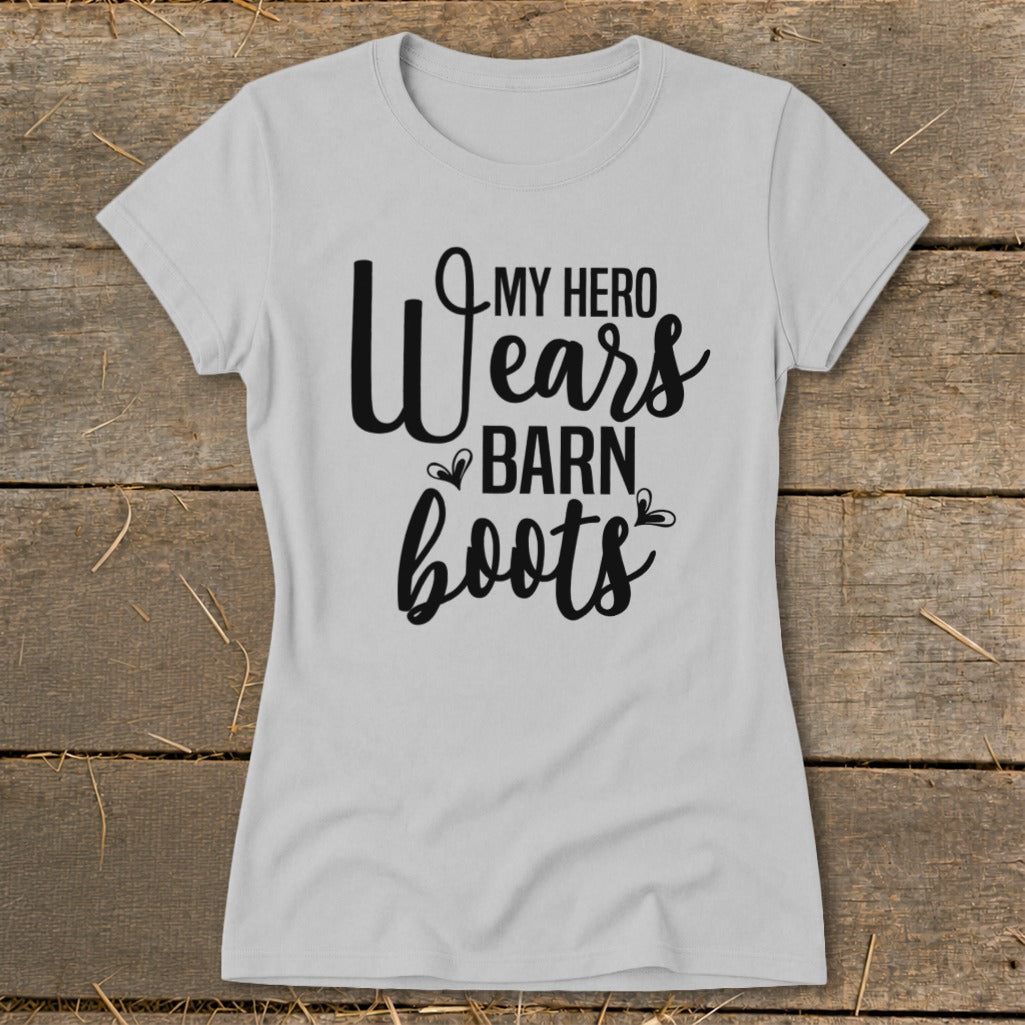 Light gray t-shirt with black text reading "My Hero Wears Barn Boots".