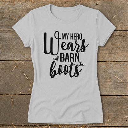 Light gray t-shirt with black text reading "My Hero Wears Barn Boots".