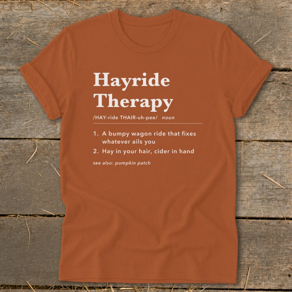 Orange t-shirt with "Hayride Therapy" definition text in white.