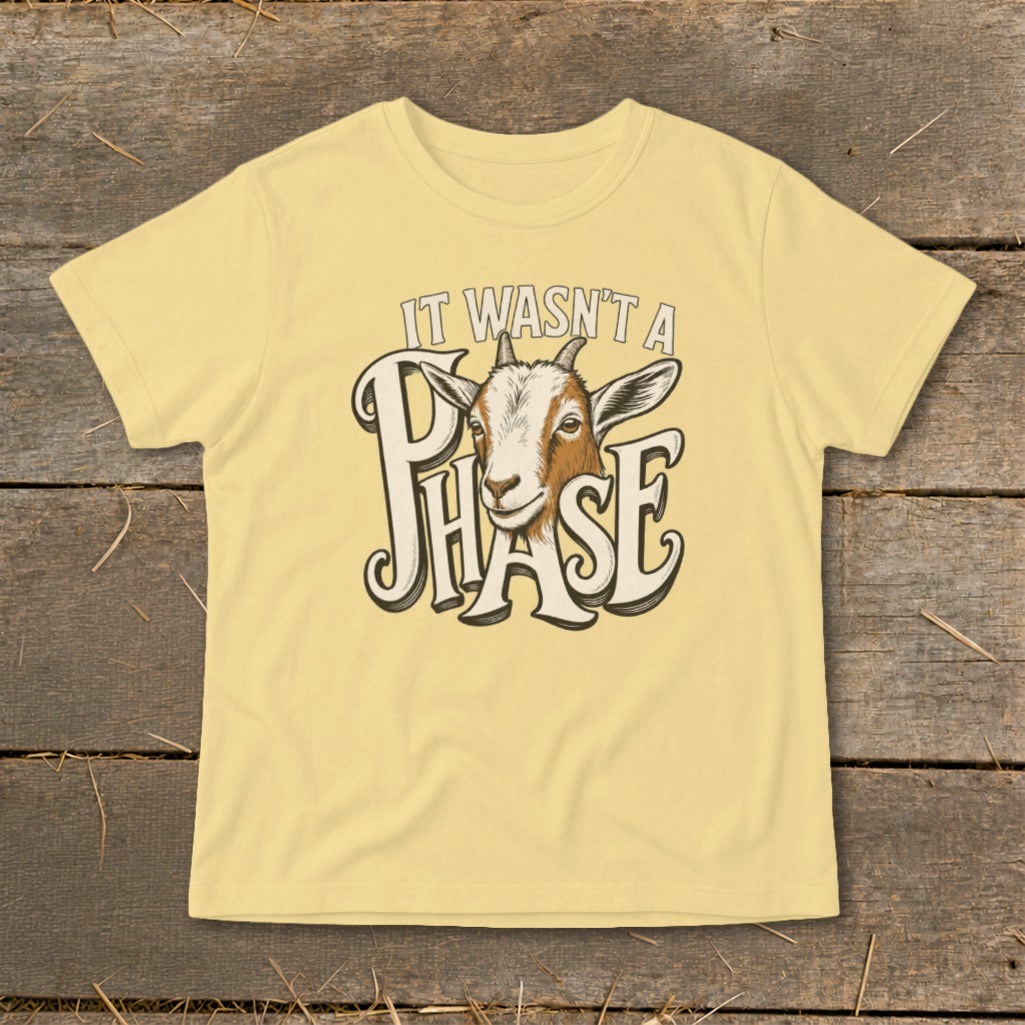 Yellow t-shirt with a goat and "It wasn't a phase" text.