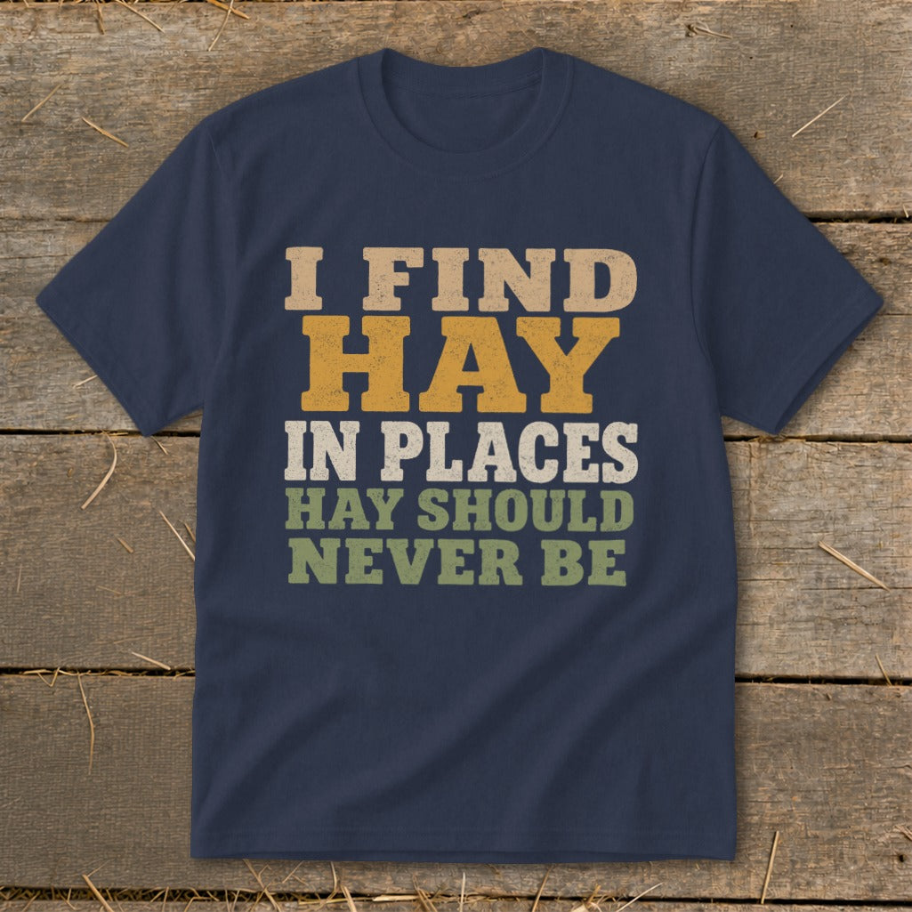 Navy t-shirt with text "I FIND HAY IN PLACES HAY SHOULD NEVER BE".