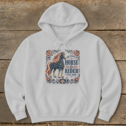 White hoodie with graphic of a starry horse and "250 Years of Horse & Rider 1776-2026" text.