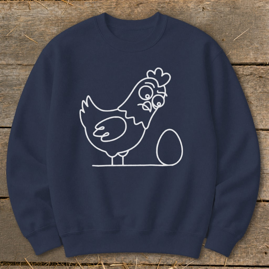 Navy sweatshirt with a white line drawing of a confused chicken next to an egg.