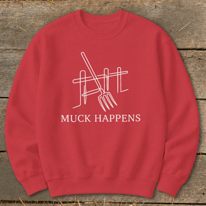Red crewneck sweatshirt with white line art of a pitchfork and fence, and text "MUCK HAPPENS".