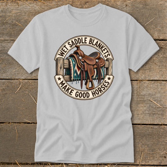 T-shirt with graphic of a saddle and blanket on a fence, reading "Wet Saddle Blankets Make Good Horses."