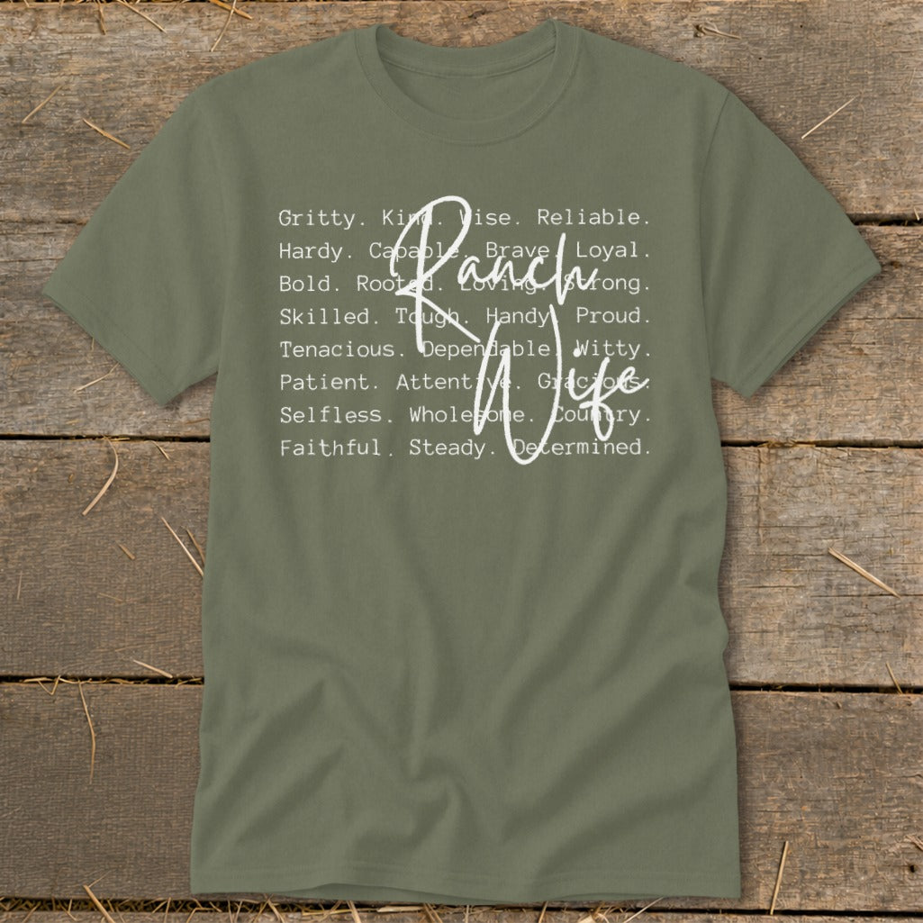 Olive green t-shirt with "Ranch Wife" and positive attributes listed around it.