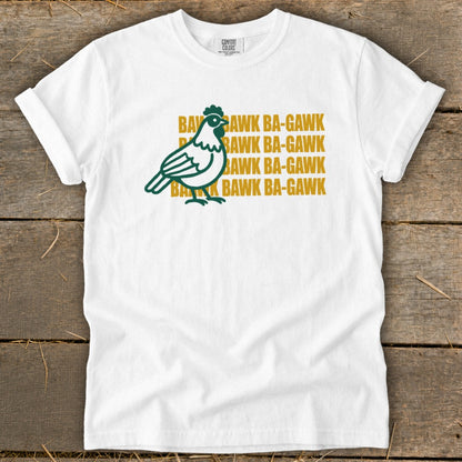 White t-shirt with green chicken graphic and repeated gold text "Bawk Ba-Gawk."