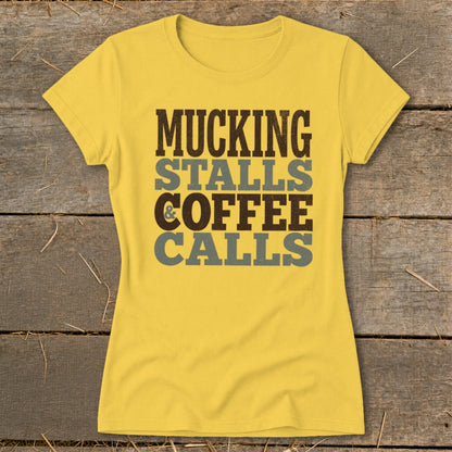 Yellow t-shirt with text "MUCKING STALLS & COFFEE CALLS".