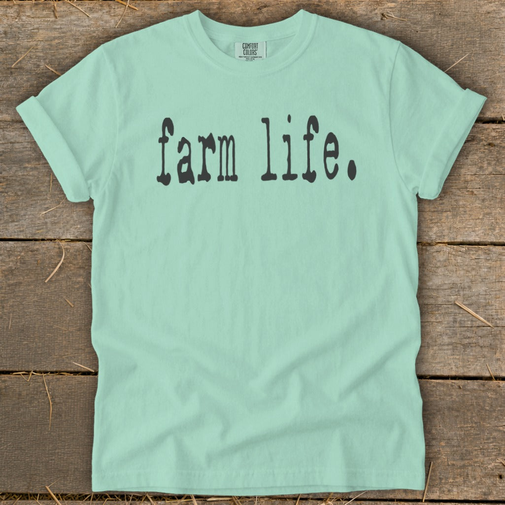 Light green t-shirt with "farm life." printed in black ink.