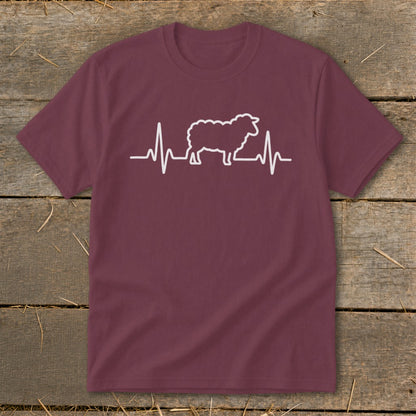 A dark maroon t-shirt with a white graphic of a sheep integrated into a heartbeat line.