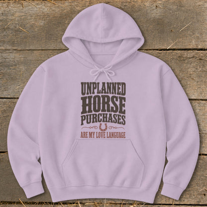 Light purple hoodie with "Unplanned Horse Purchases Are My Love Language" text.