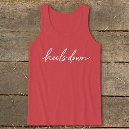 Coral tank top with white "heels down" script text.