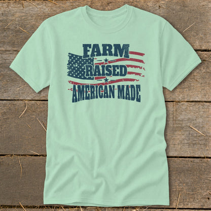 Light mint t-shirt with distressed American flag and text "FARM RAISED AMERICAN MADE".
