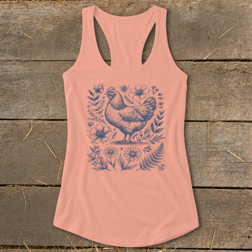 Peach tank top with a blue line drawing of a chicken surrounded by flowers.