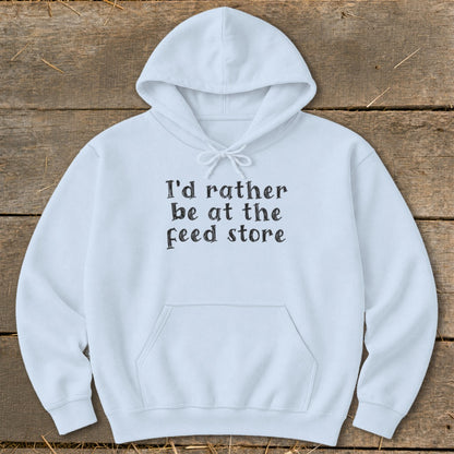 White hoodie with "I'd rather be at the feed store" text.