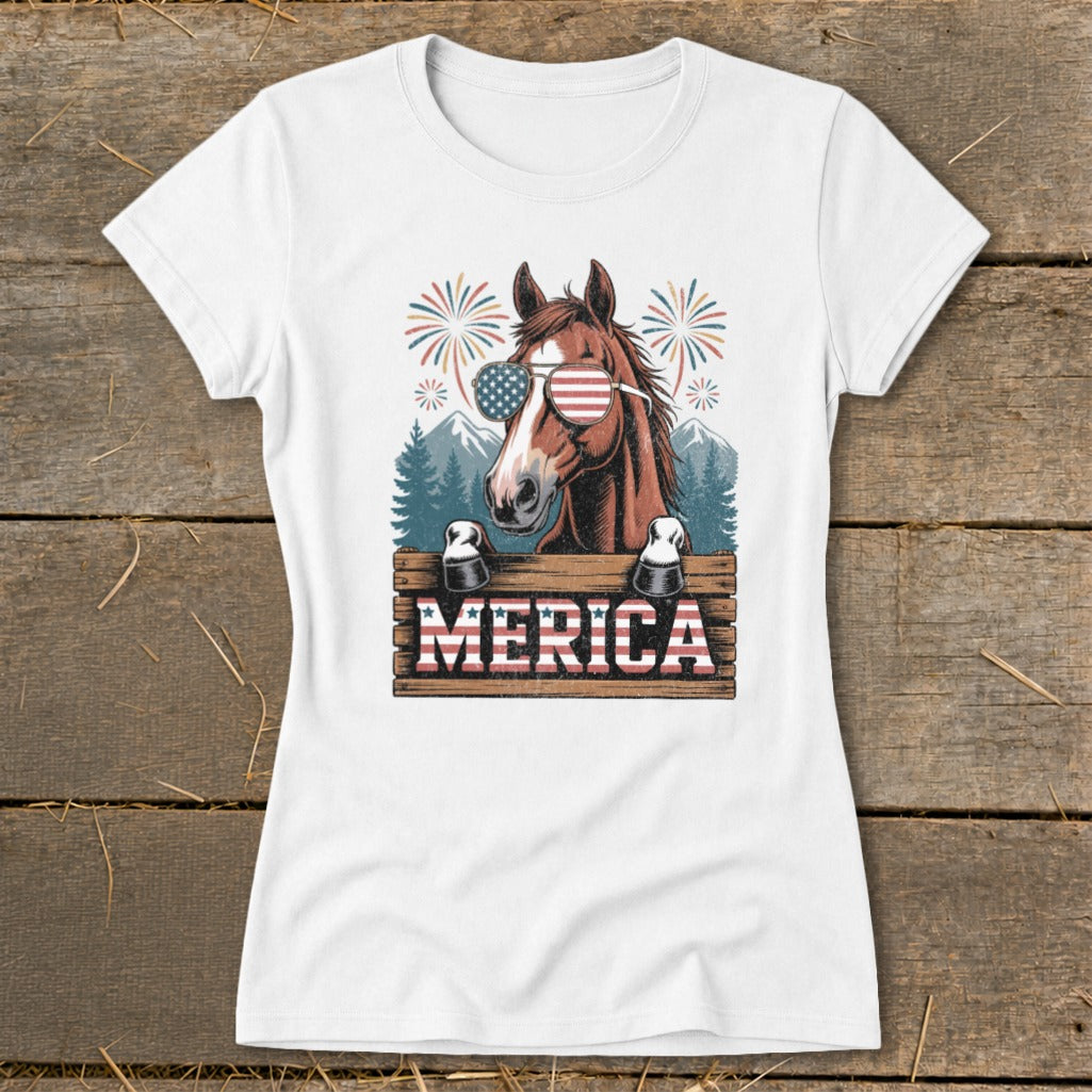 Horse wearing American flag sunglasses with "MERICA" text and fireworks.