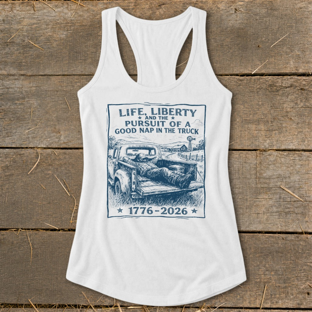 White tank top with "Life, Liberty, and the Pursuit of a Good Nap in the Truck" graphic.