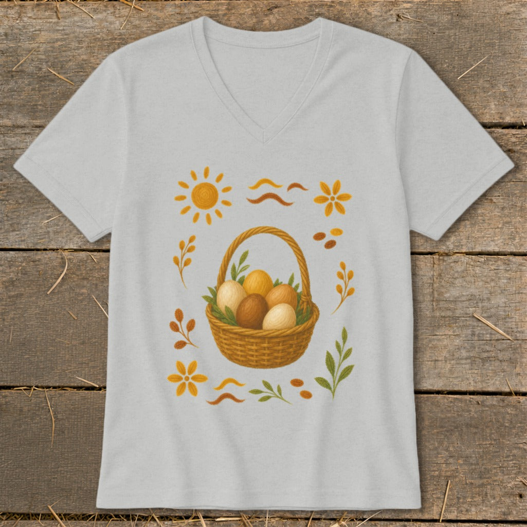 Light gray t-shirt with woven basket filled with eggs and surrounding autumn leaf and sun graphics.