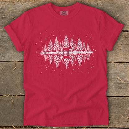 Red t-shirt with white pine trees reflecting in water and a deer silhouette.