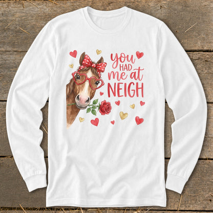 White long-sleeve shirt with a horse wearing heart glasses and "You had me at NEIGH" text.
