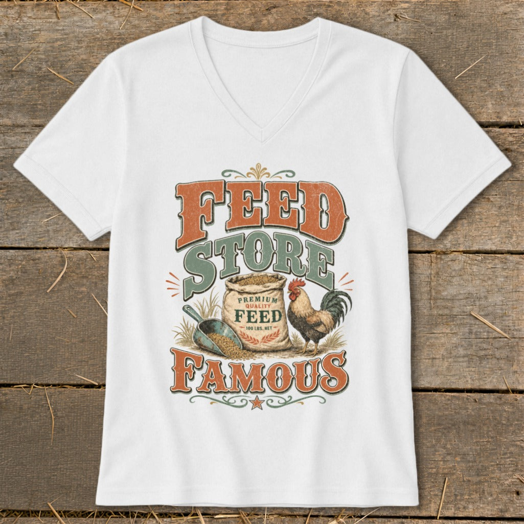 White t-shirt with "FEED STORE FAMOUS" graphic featuring a feed bag, scoop, and rooster.