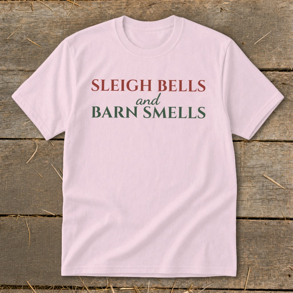 Pink t-shirt with "Sleigh Bells and Barn Smells" text.