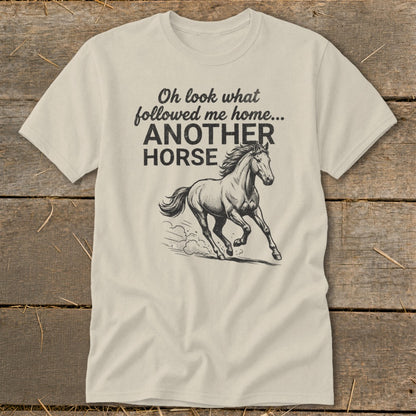 Cream t-shirt with "Oh look what followed me home... ANOTHER HORSE" and a horse illustration.