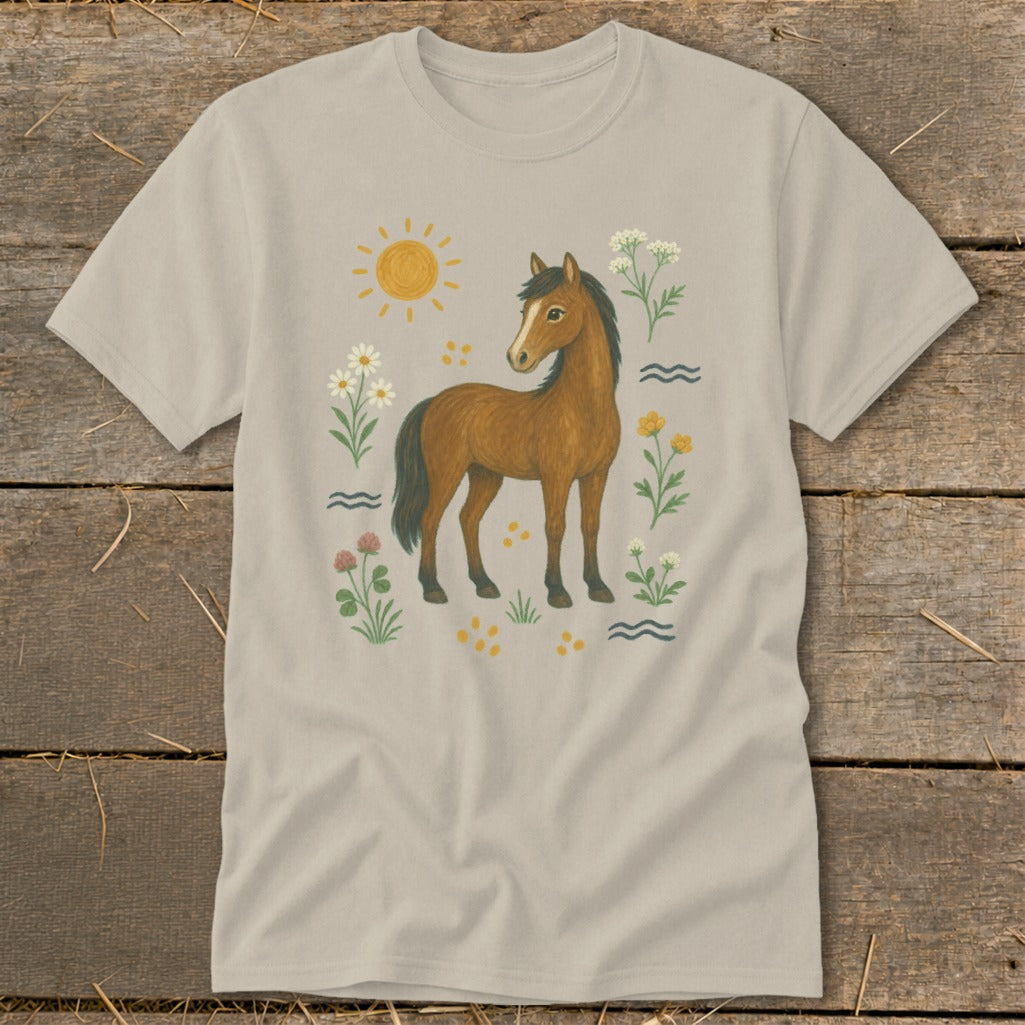 T-shirt with a brown horse surrounded by flowers, sunshine, and water waves.