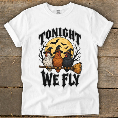 White t-shirt with "TONIGHT WE FLY" text and three chickens on a broomstick.