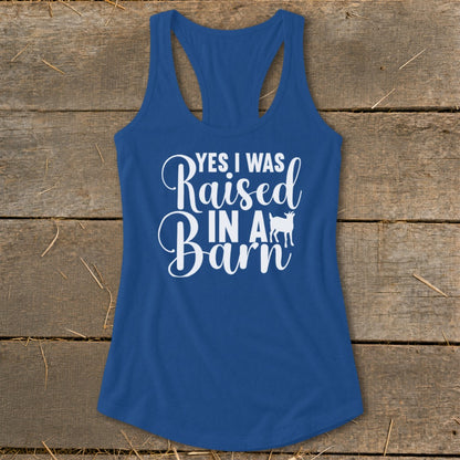 Blue tank top with white text and a goat graphic reading "Yes I Was Raised In A Barn".