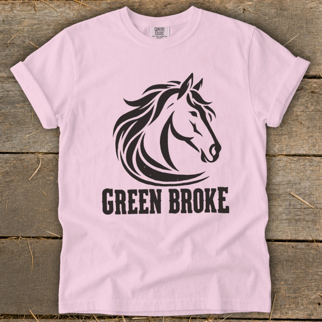 Light pink t-shirt featuring a black horse head graphic and the text GREEN BROKE.