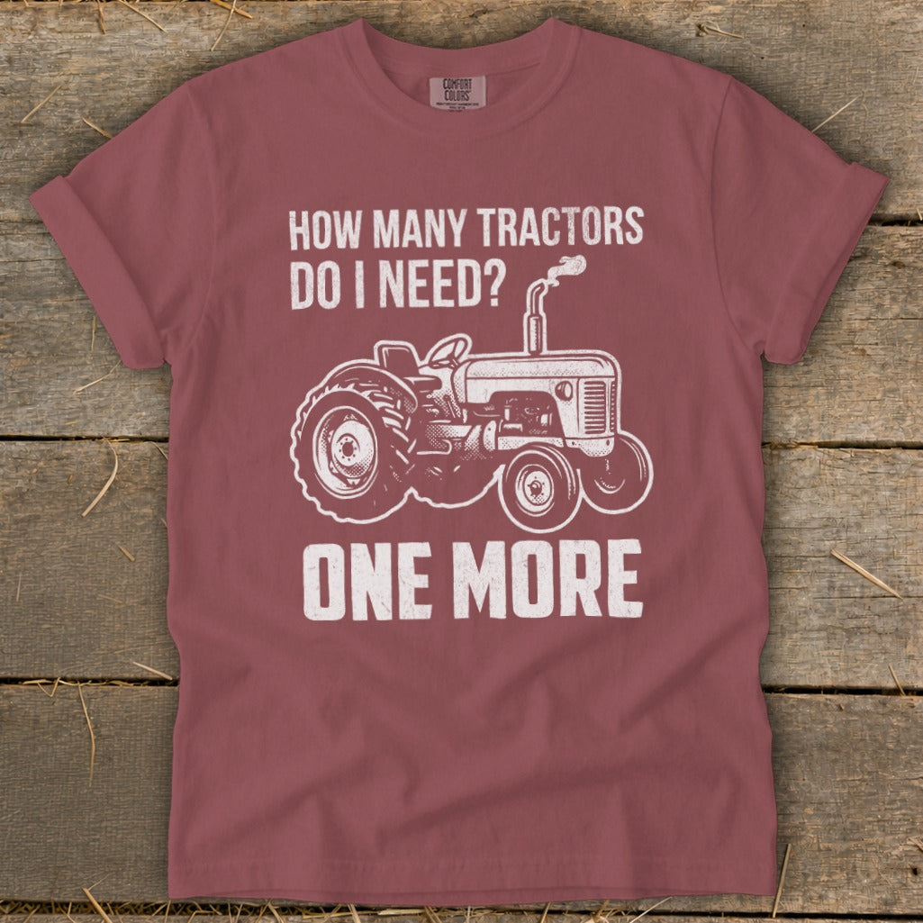 T-shirt with "How Many Tractors Do I Need? One More" and tractor graphic.