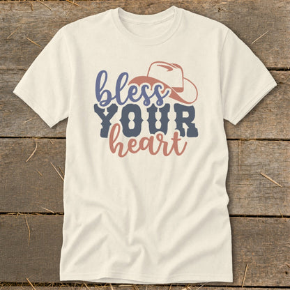 Cream t-shirt with "bless YOUR heart" text and cowboy hat graphic.