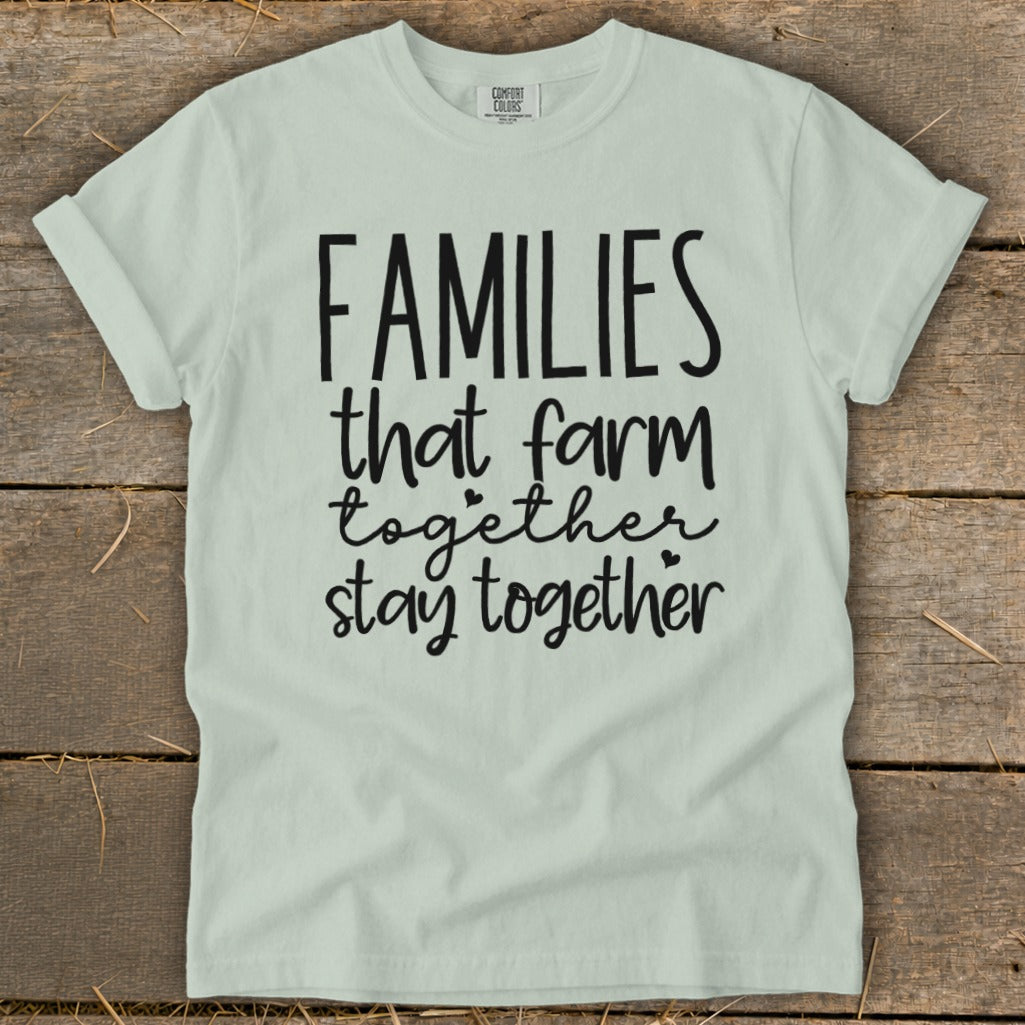 Light green t-shirt with "FAMILIES that farm together stay together" text.