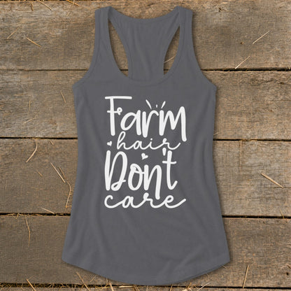 Gray tank top with white text reading "Farm hair Don't care".