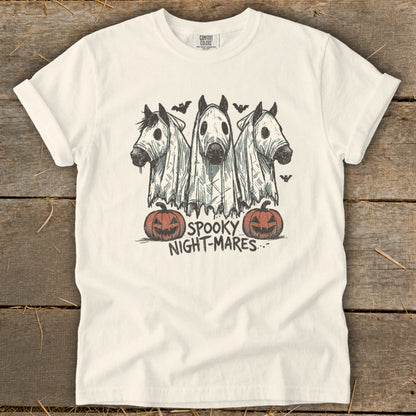 Three horses in ghost costumes with pumpkins and bats, reading "Spooky Night-Mares."