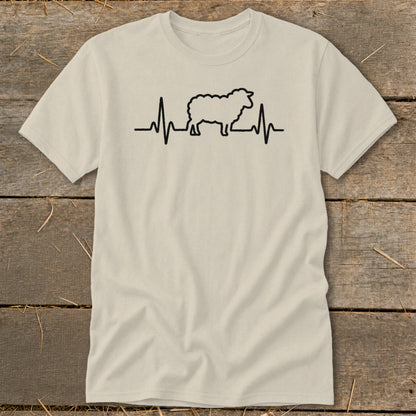 Light beige t-shirt featuring a black graphic of a sheep silhouette with a heartbeat line passing through it.
