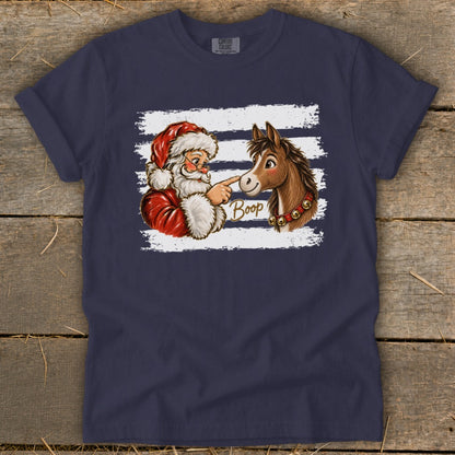 Santa boops a horse's nose with the word "Boop" written beside them.