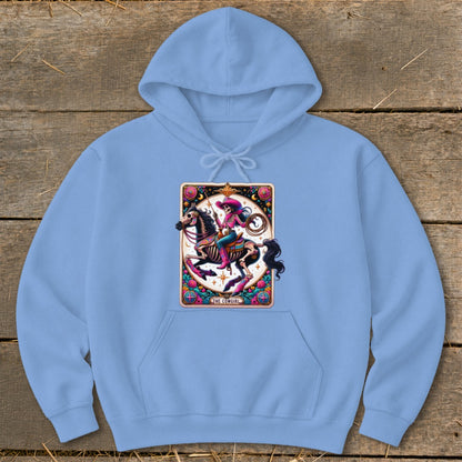 Light blue hoodie featuring a "The Cowgirl" graphic of a skeleton riding a horse with lasso and pink accents.