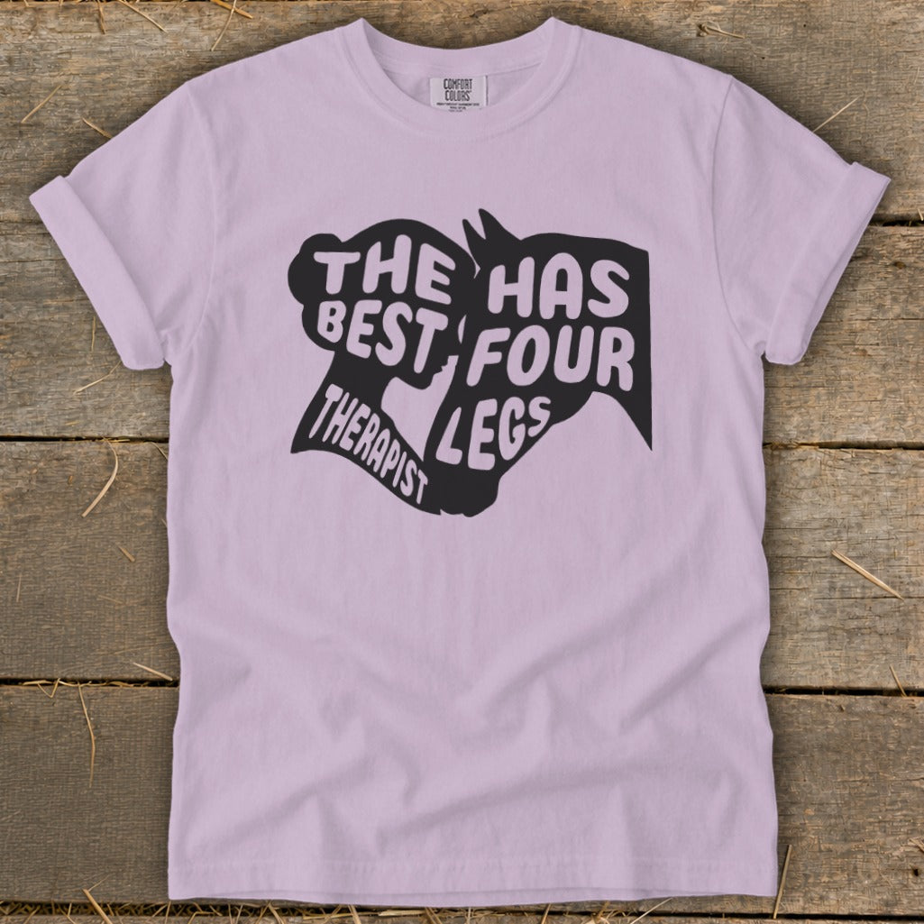 Light purple t-shirt with "The Best Therapist Has Four Legs" text and horse silhouette graphic.