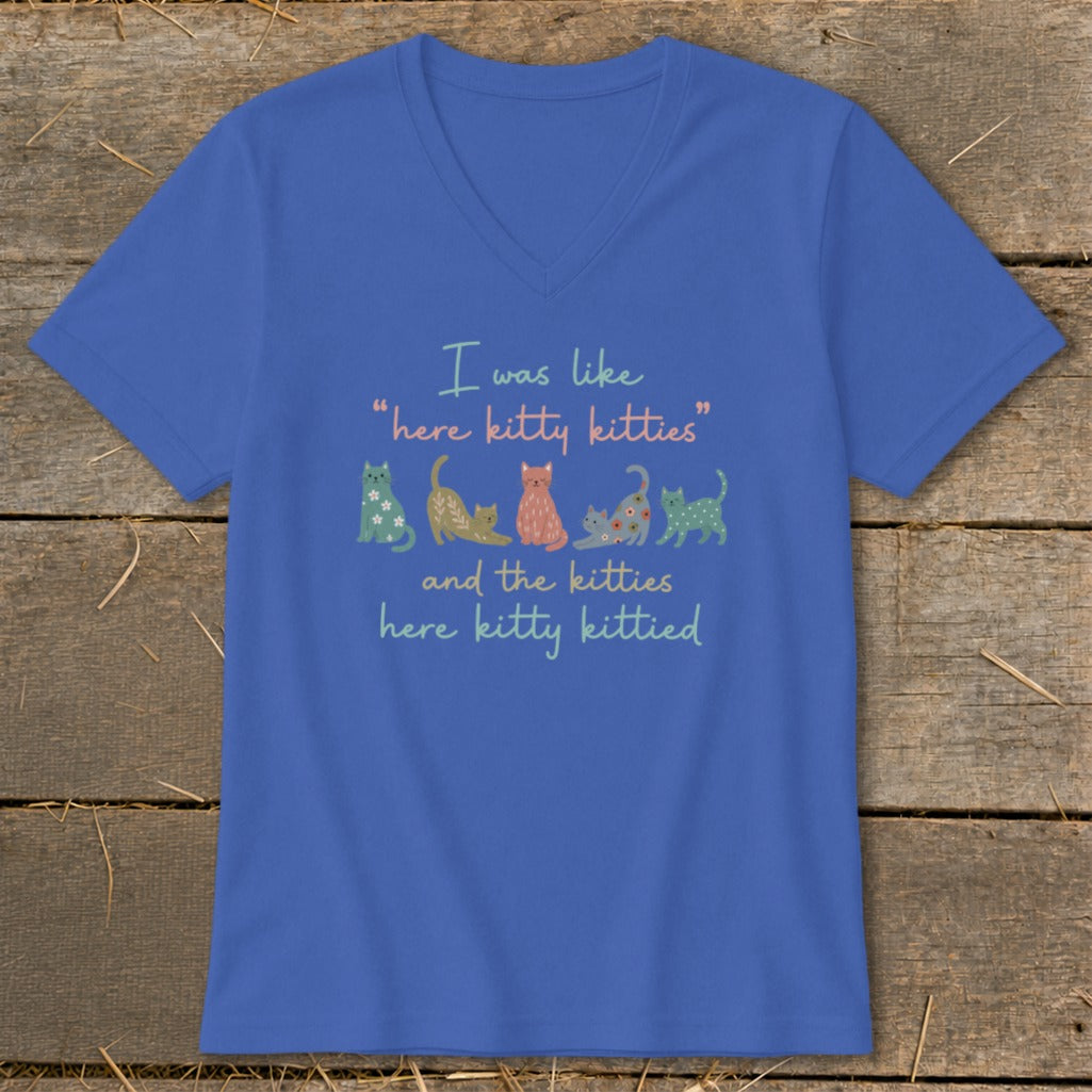 Blue t-shirt with text and colorful cartoon cats: "I was like 'here kitty kitties' and the kitties here kitty kittied."